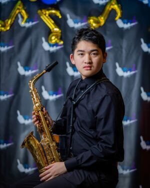 Headshot: Alex-saxophone-portrait